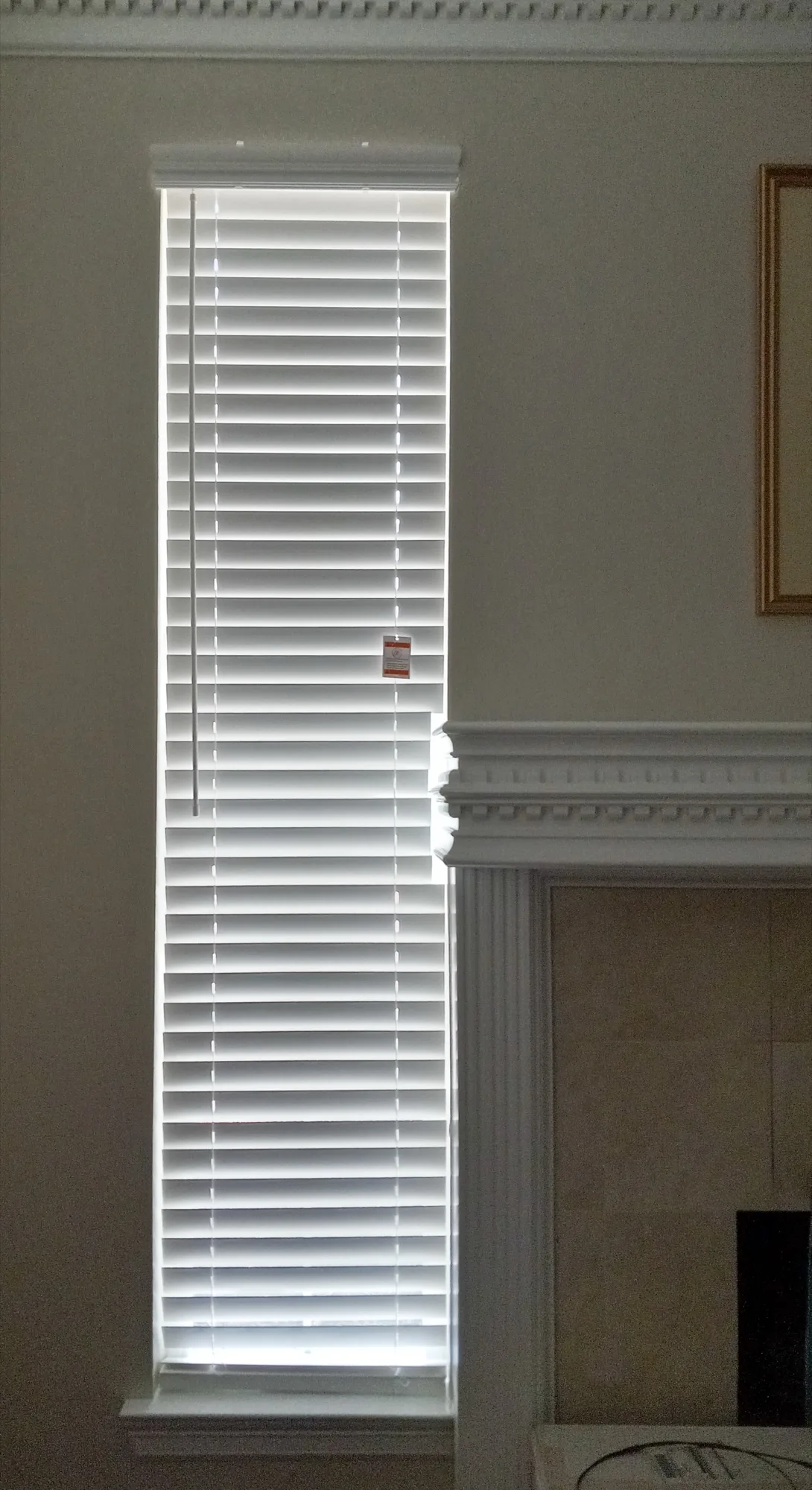 2-inch white faux wood blinds installed in a Plano, TX home
