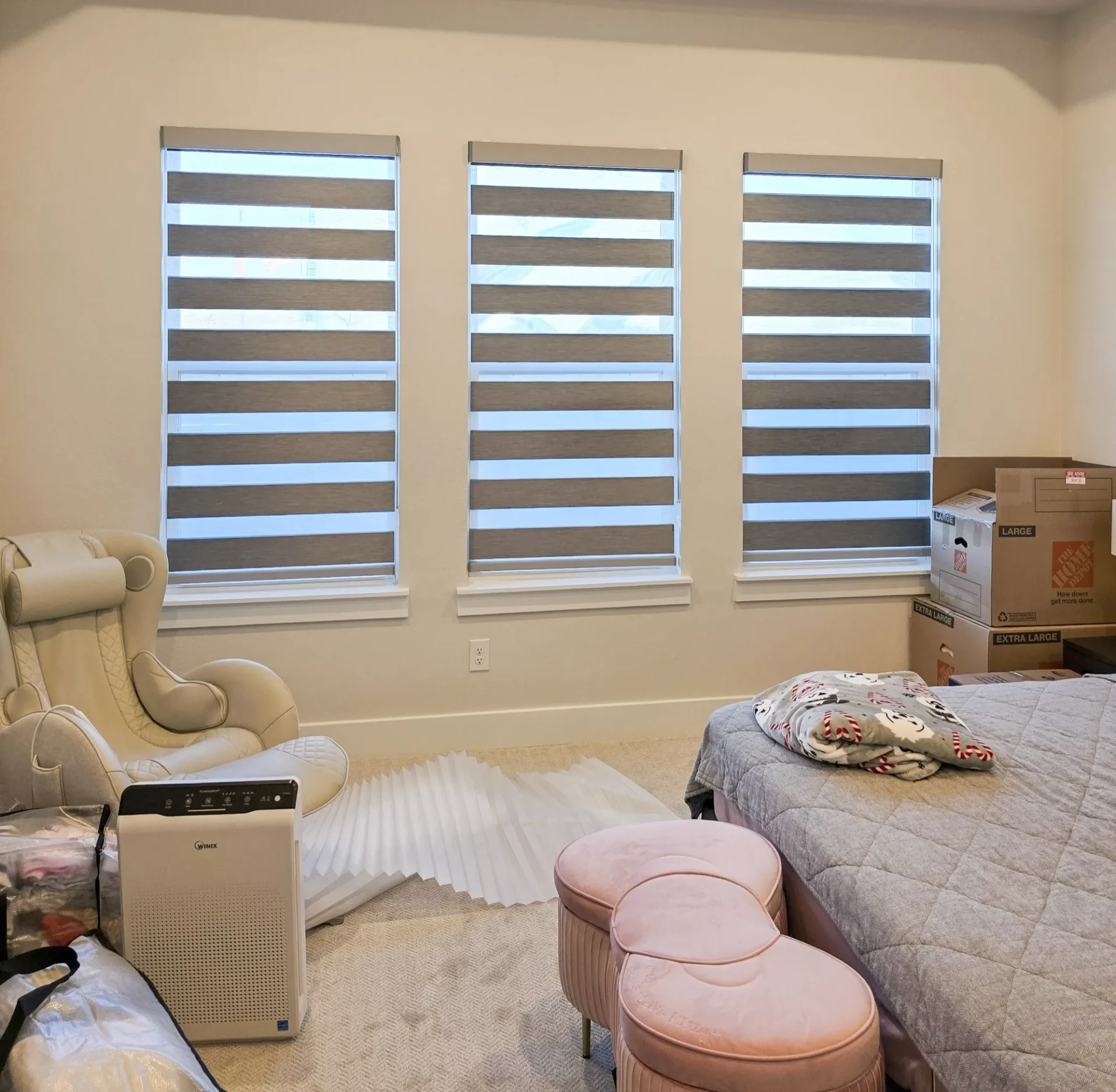 Arapaho light grey blackout zebra shades installed in a McKinney, TX home