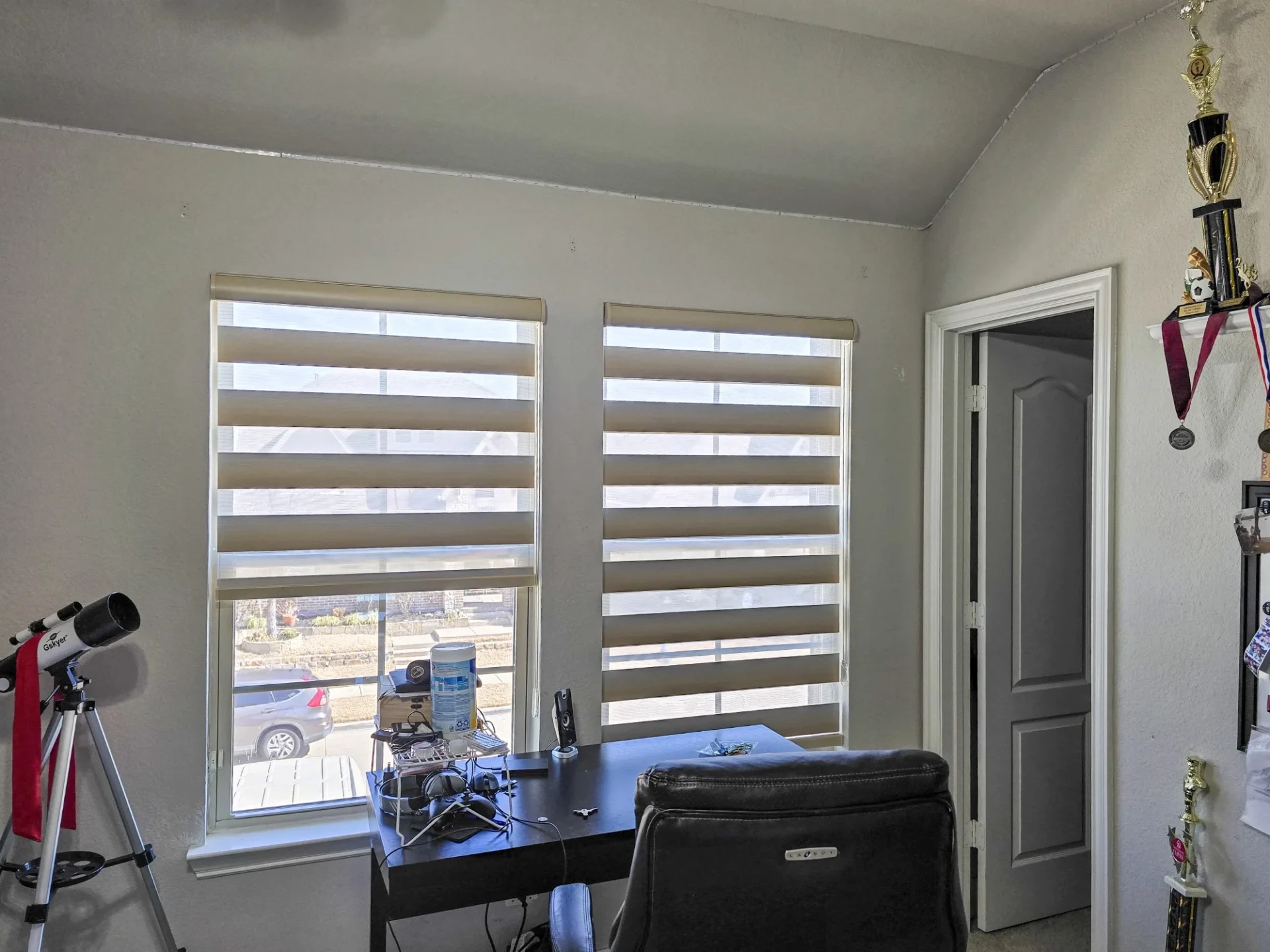Maumee white blackout zebra shades installed in a McKinney, TX home