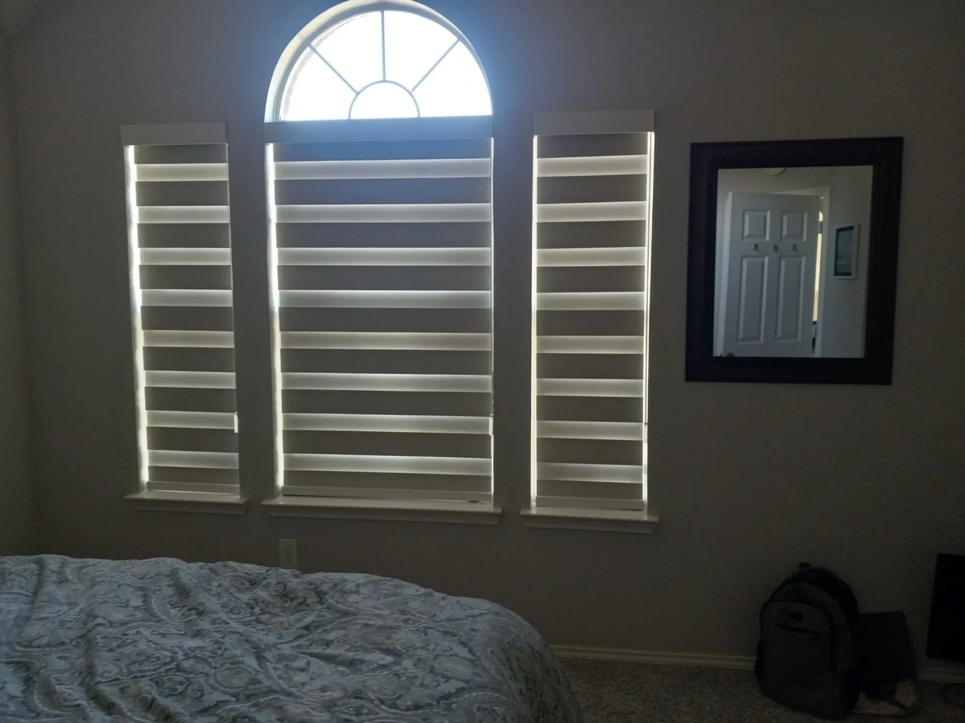 Marsh mushroom blackout zebra shades on side-by-side bedroom windows in a Frisco, TX home