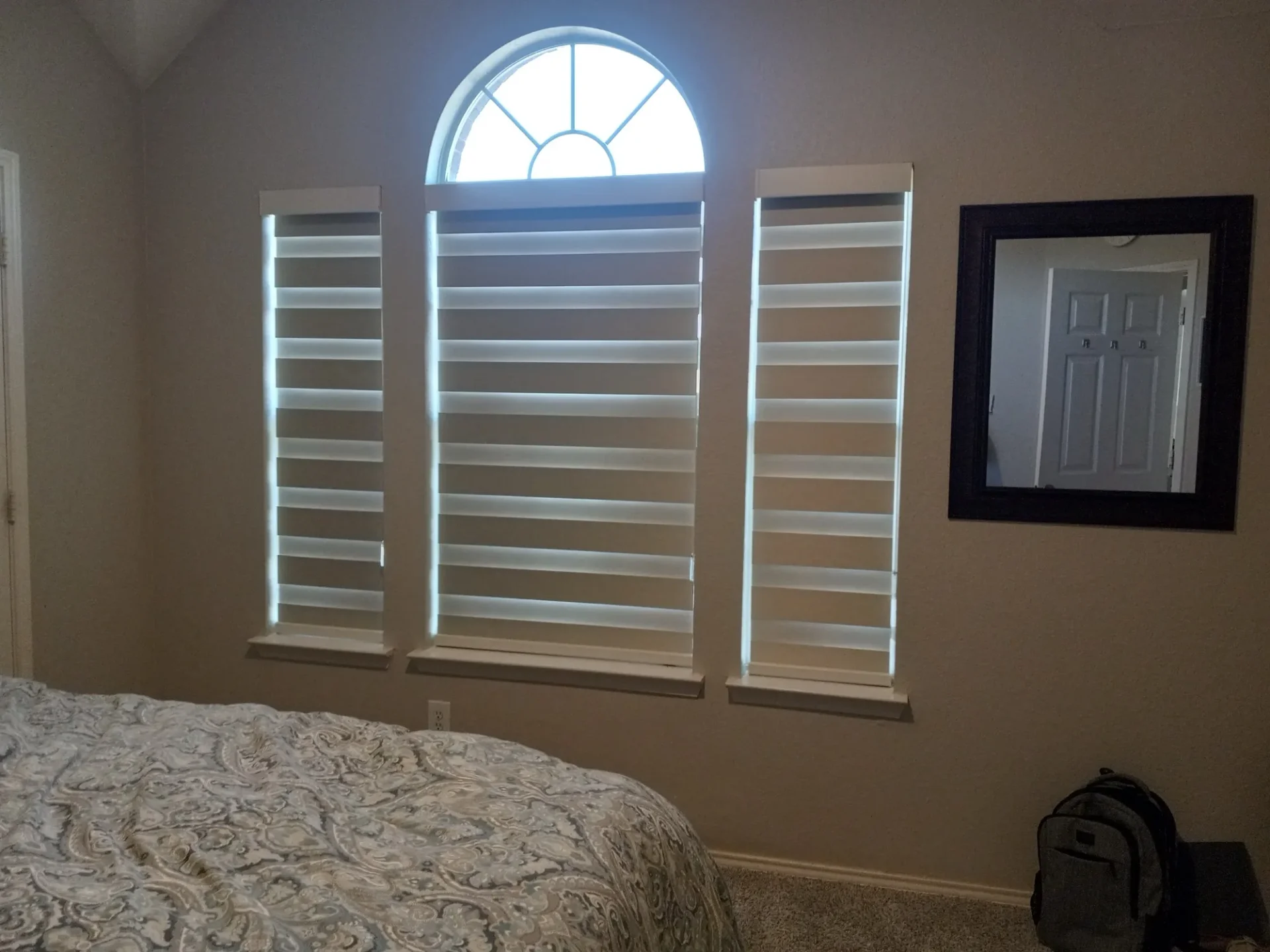 Three Marsh mushroom blackout zebra shades closed in a Frisco, TX bedroom