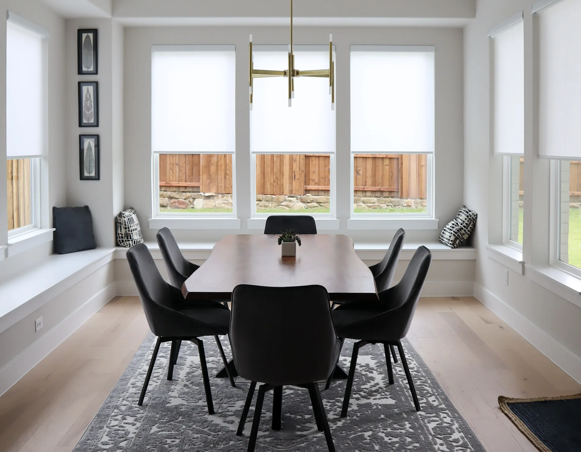 Light-filtering roller shades on dining room windows
