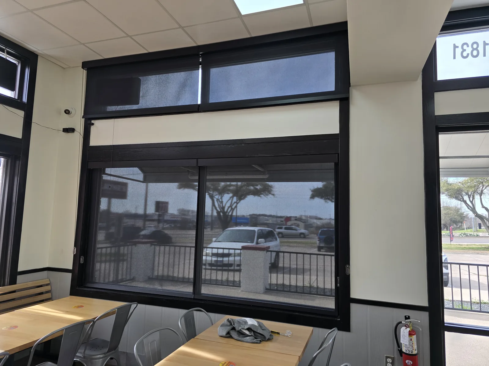 Sunscreen cutting glare on a restaurant storefront window